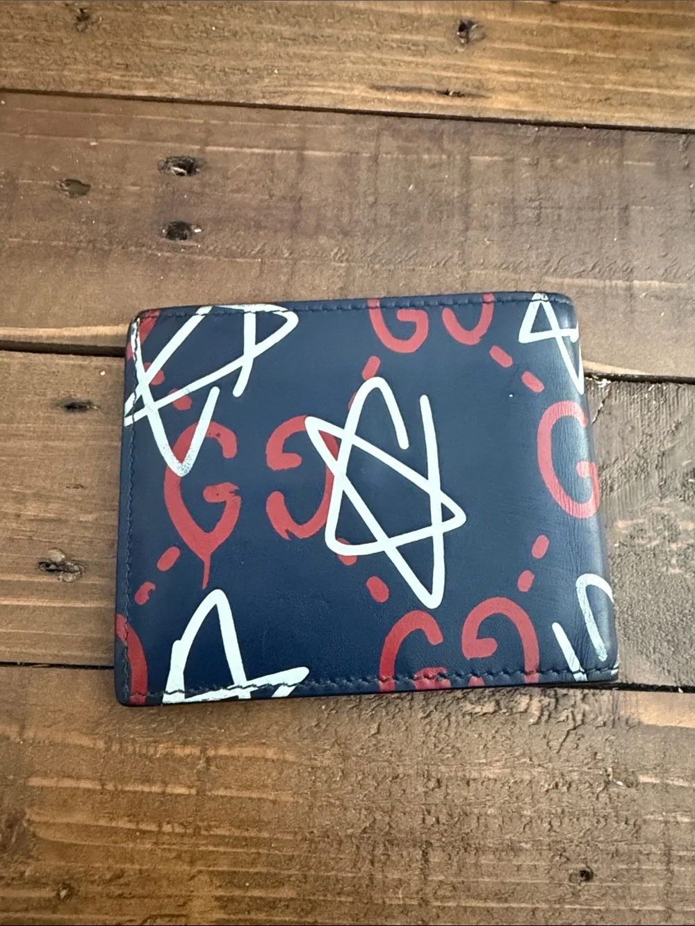 Gucci Navy Blue Wallet with Red GG and White Star Graphics